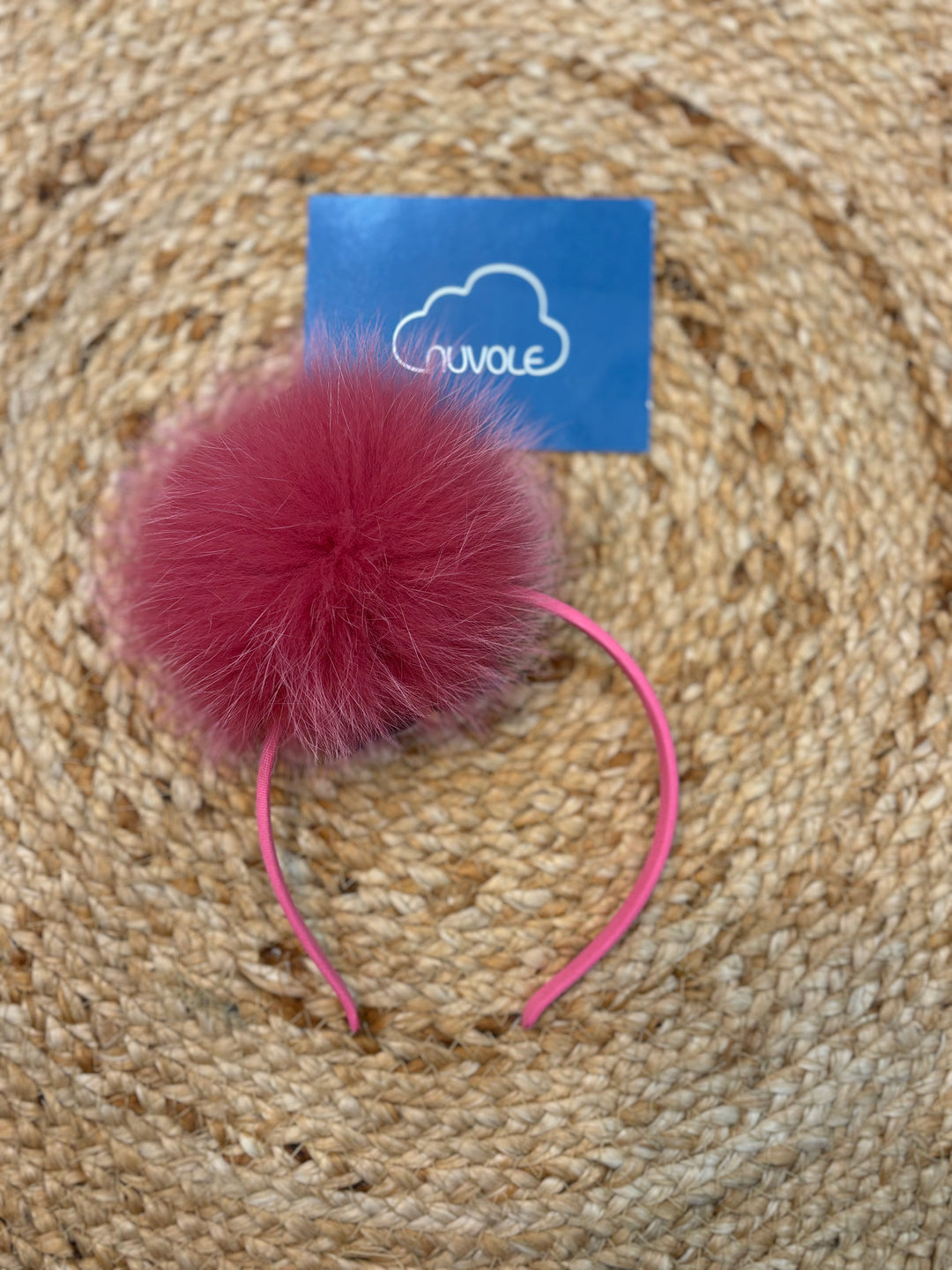Cerchietto con pompon fuxia