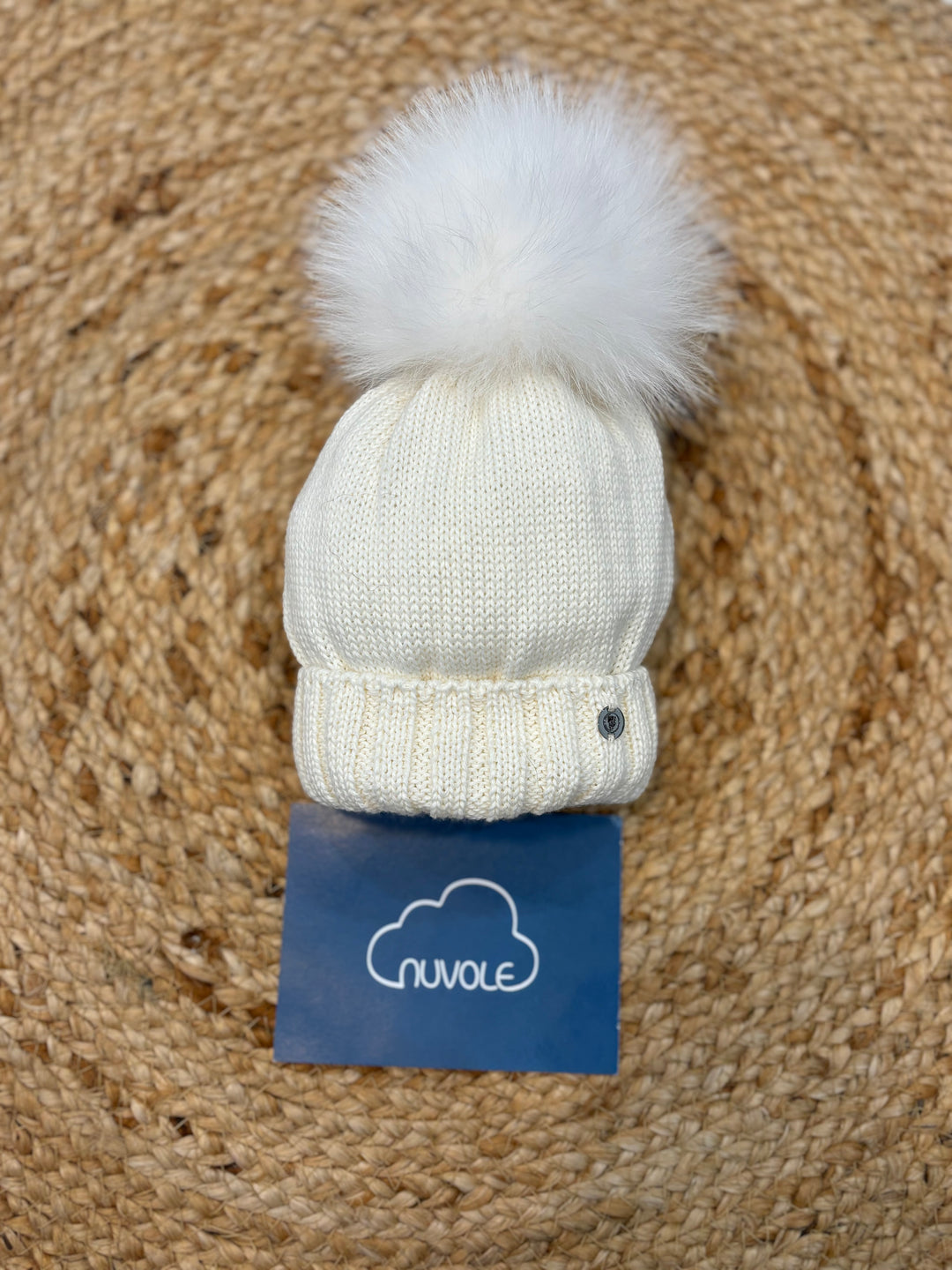 Cappello con pompon in volpe bianco