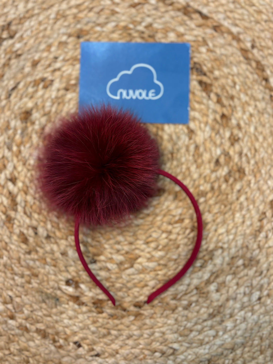 Cerchietto con pompon bordeaux