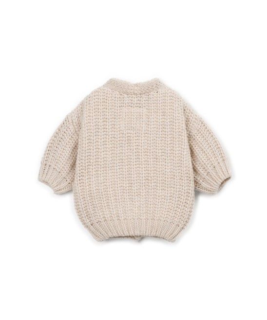 Cardigan over sabbia