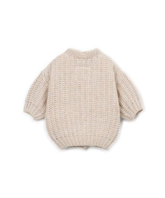 Cardigan over sabbia