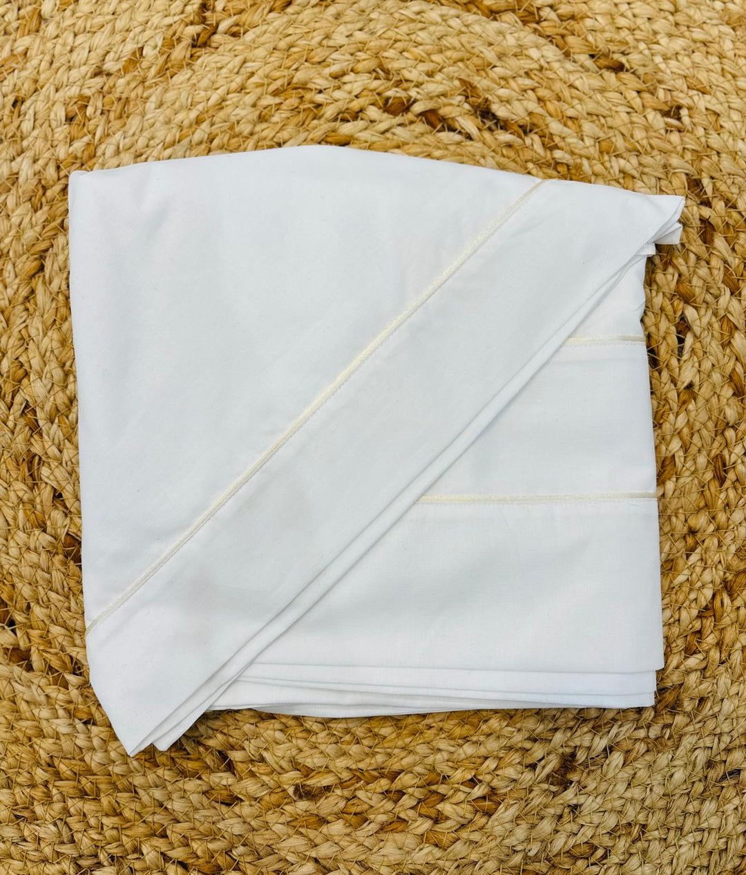 Set lenzuola con piping ecrù