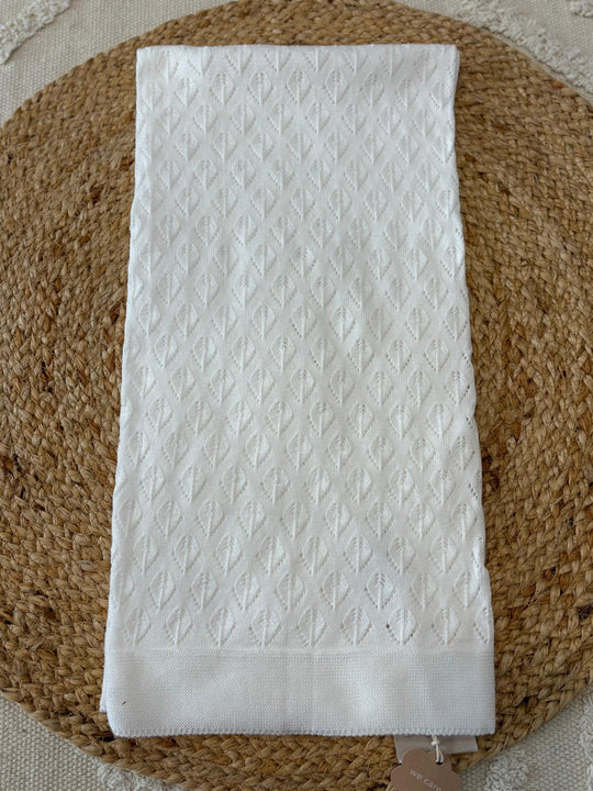 Coperta lavorata bianca